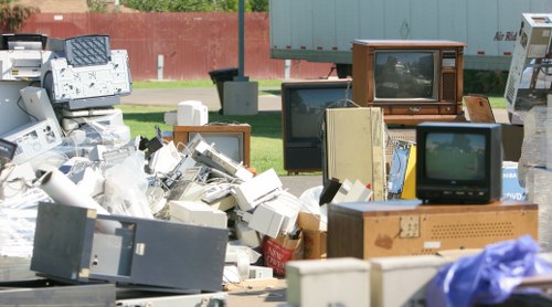 Professional team conducting home clearance in Downham residence